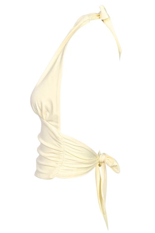 Woman wearing a figure flattering Aby Halter Top - Butter Yellow BODYCON COLLECTION Pty Ltd