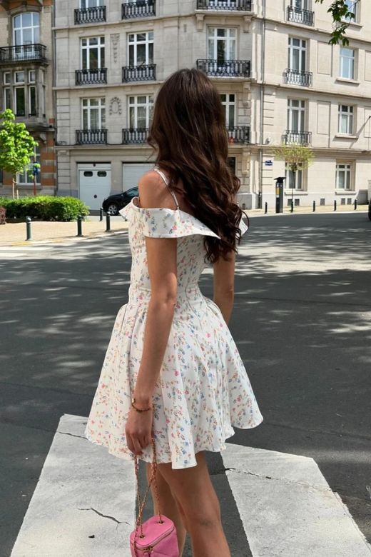 Woman wearing a figure flattering Allanah Bodycon Day Mini Dress - Pearl White BODYCON COLLECTION
