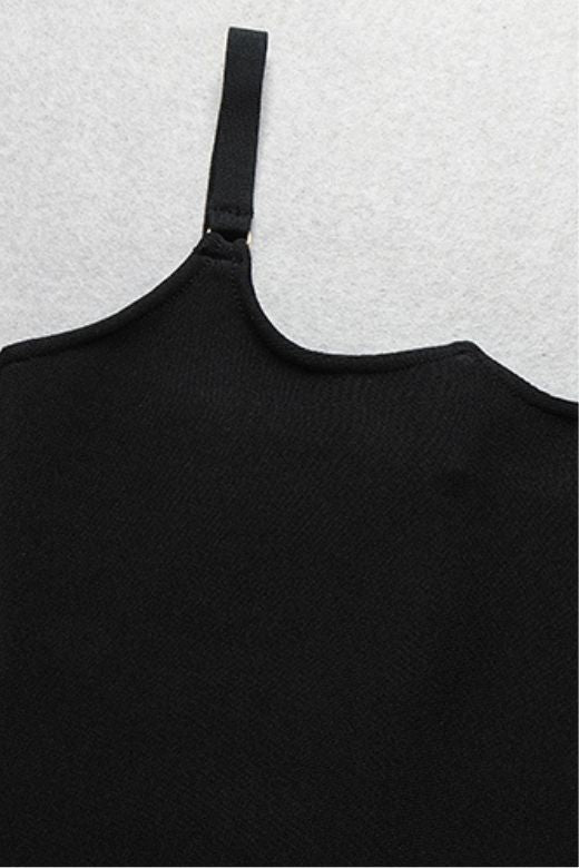 Woman wearing a figure flattering Amber Bandage Dress - Classic Black Bodycon Collection