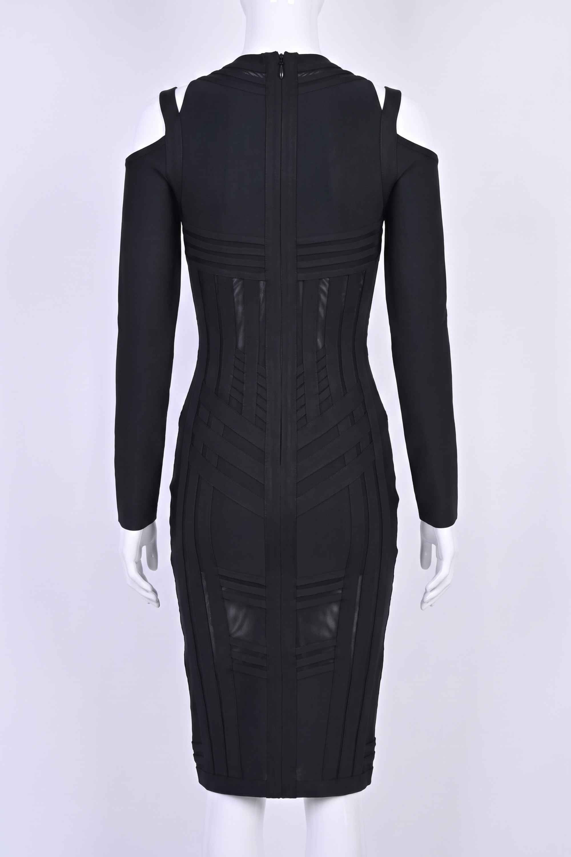 Woman wearing a figure flattering Amelia Long Sleeve Bandage Dress - Classic Black BODYCON COLLECTION