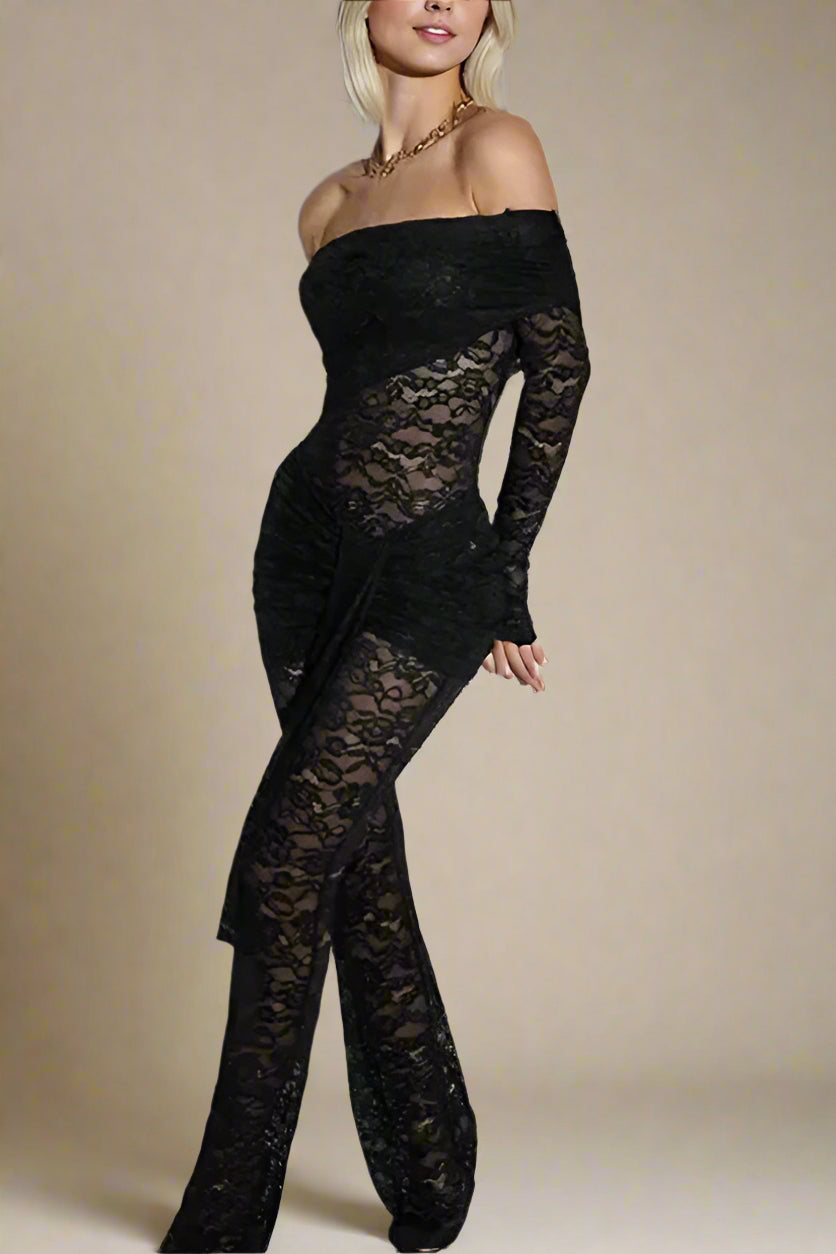 Woman wearing a figure flattering Andie Long Sleeve Bodycon Wrap Jumpsuit - Classic Black BODYCON COLLECTION