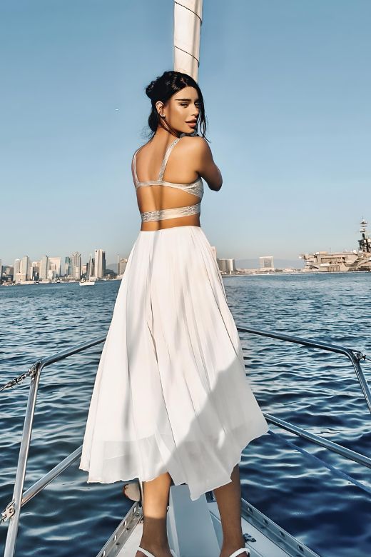 Woman wearing a figure flattering Ang Bandage Crop Top - Gold BODYCON COLLECTION