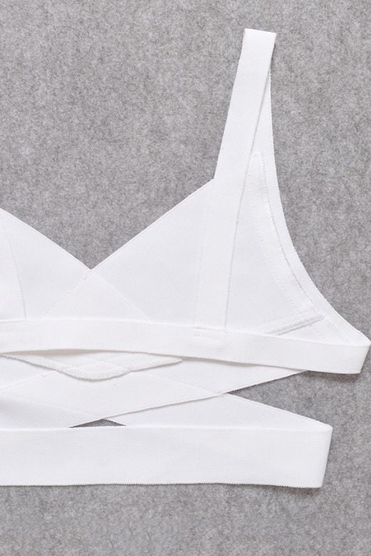 Woman wearing a figure flattering Ang Bandage Crop Top - Pearl White BODYCON COLLECTION