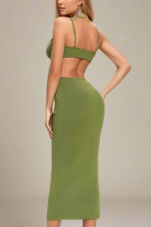 Woman wearing a figure flattering Aria Bodycon Day Maxi Dress - Emerald Green BODYCON COLLECTION