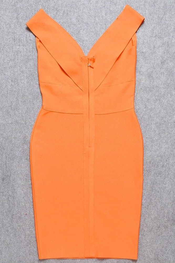 Woman wearing a figure flattering Ash Bandage Dress - Apricot Orange Bodycon Collection