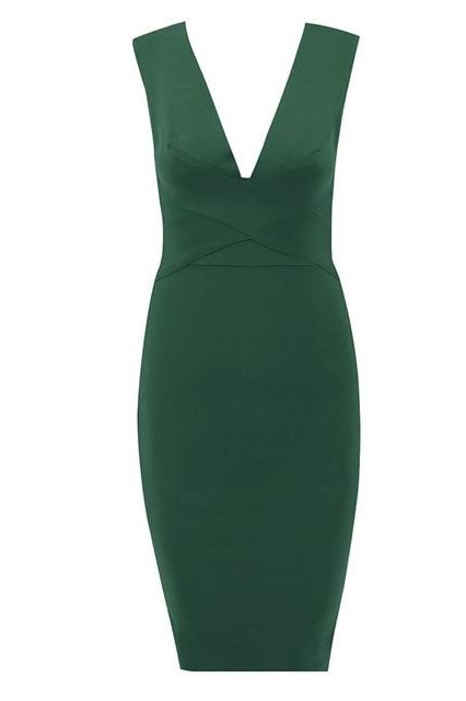 Woman wearing a figure flattering Ash Bandage Dress - Emerald Green Bodycon Collection