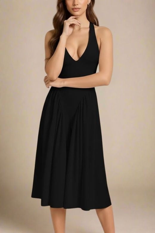 Woman wearing a figure flattering Austen Bodycon Midi Dress - Classic Black BODYCON COLLECTION
