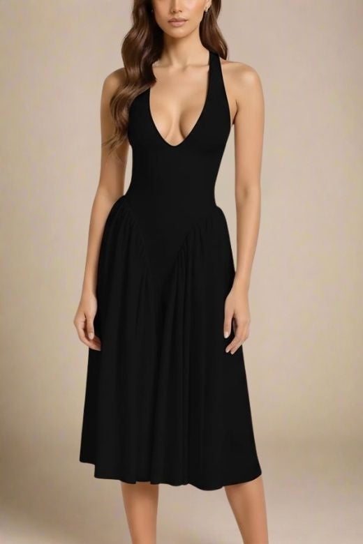 Woman wearing a figure flattering Austen Bodycon Midi Dress - Classic Black BODYCON COLLECTION