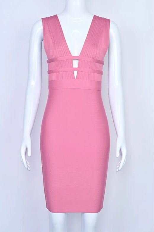Woman wearing a figure flattering Bay Bandage Dress - Ballet Pink Bodycon Collection