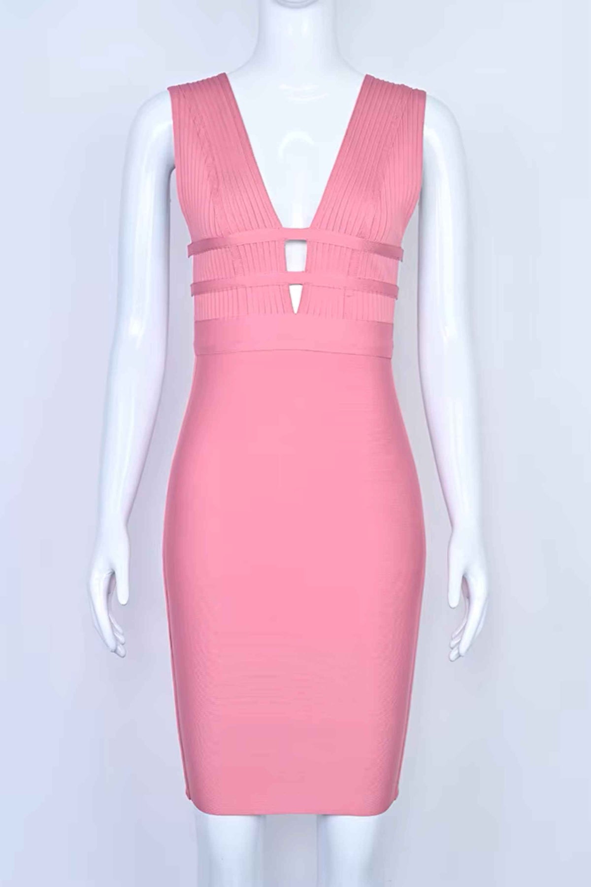 Woman wearing a figure flattering Bay Bandage Dress - Ballet Pink Bodycon Collection