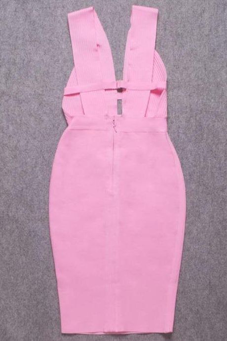 Woman wearing a figure flattering Bay Bandage Dress - Blush Pink Bodycon Collection