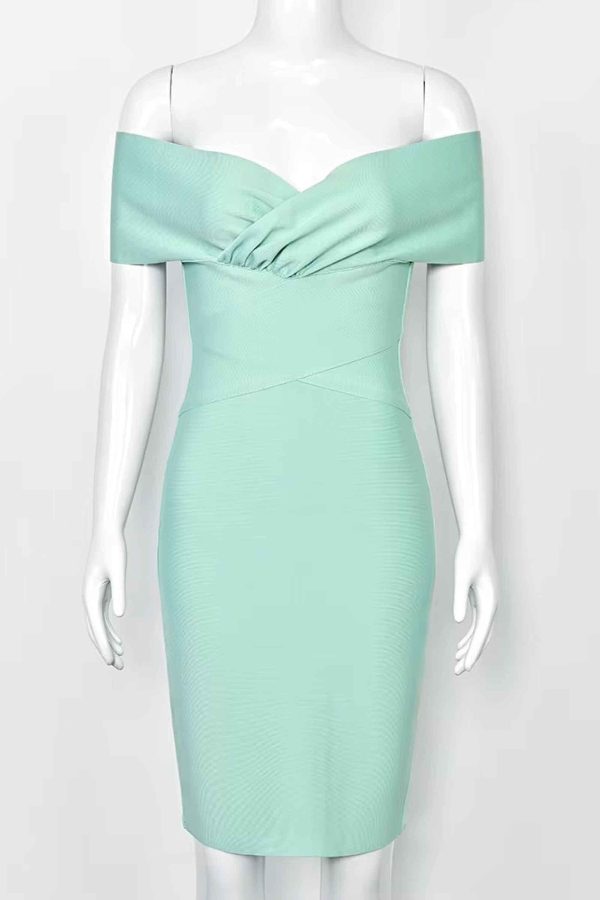Woman wearing a figure flattering Bea Bandage Dress - Mint Green Bodycon Collection
