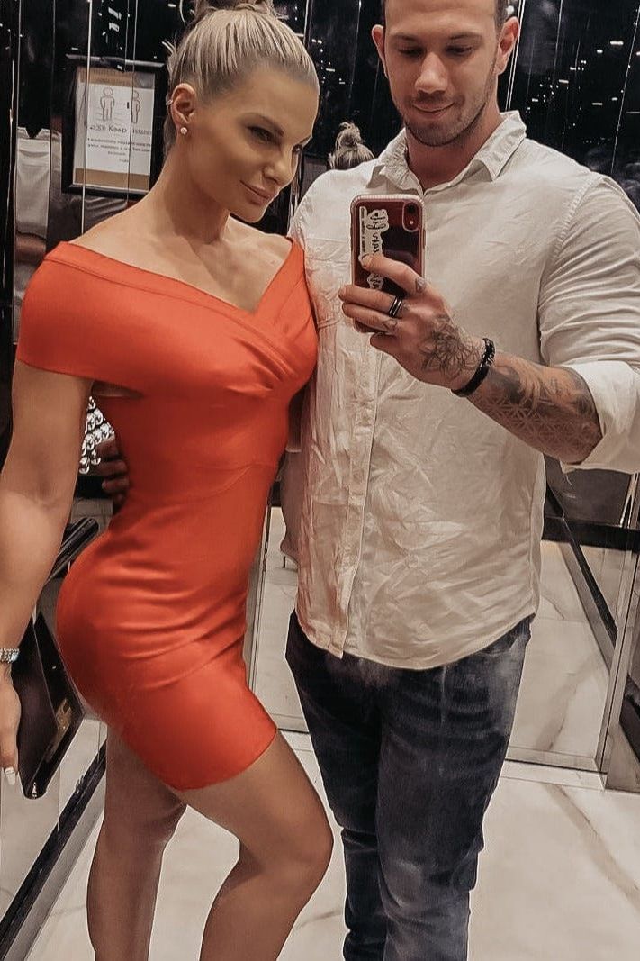 Woman wearing a figure flattering Bea Bandage Dress - Mint Green Bodycon Collection