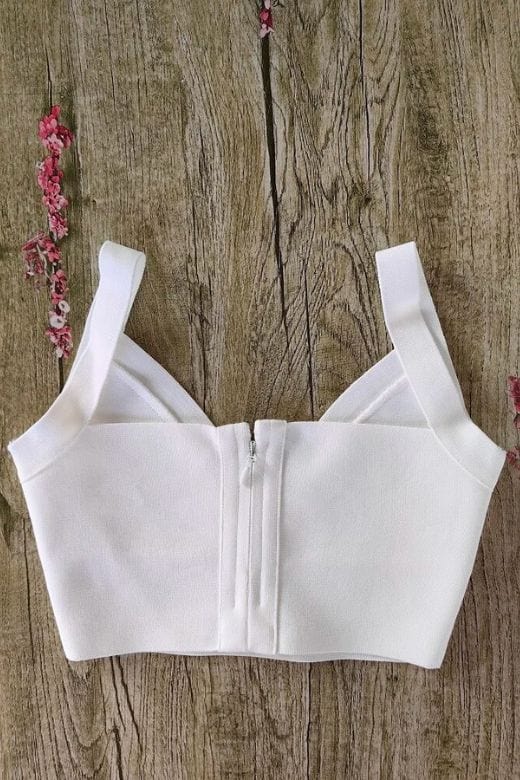 Woman wearing a figure flattering Bee Bandage Crop Top - Pearl White BODYCON COLLECTION