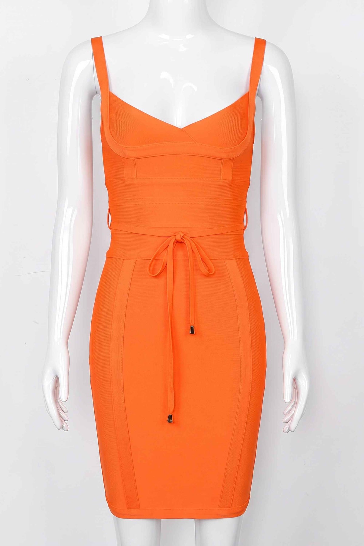 Woman wearing a figure flattering Bek Bandage Dress - Apricot Orange Bodycon Collection