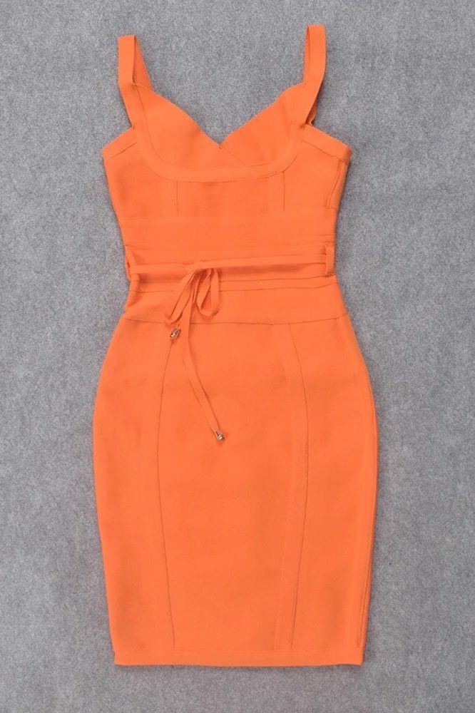 Woman wearing a figure flattering Bek Bandage Dress - Apricot Orange Bodycon Collection