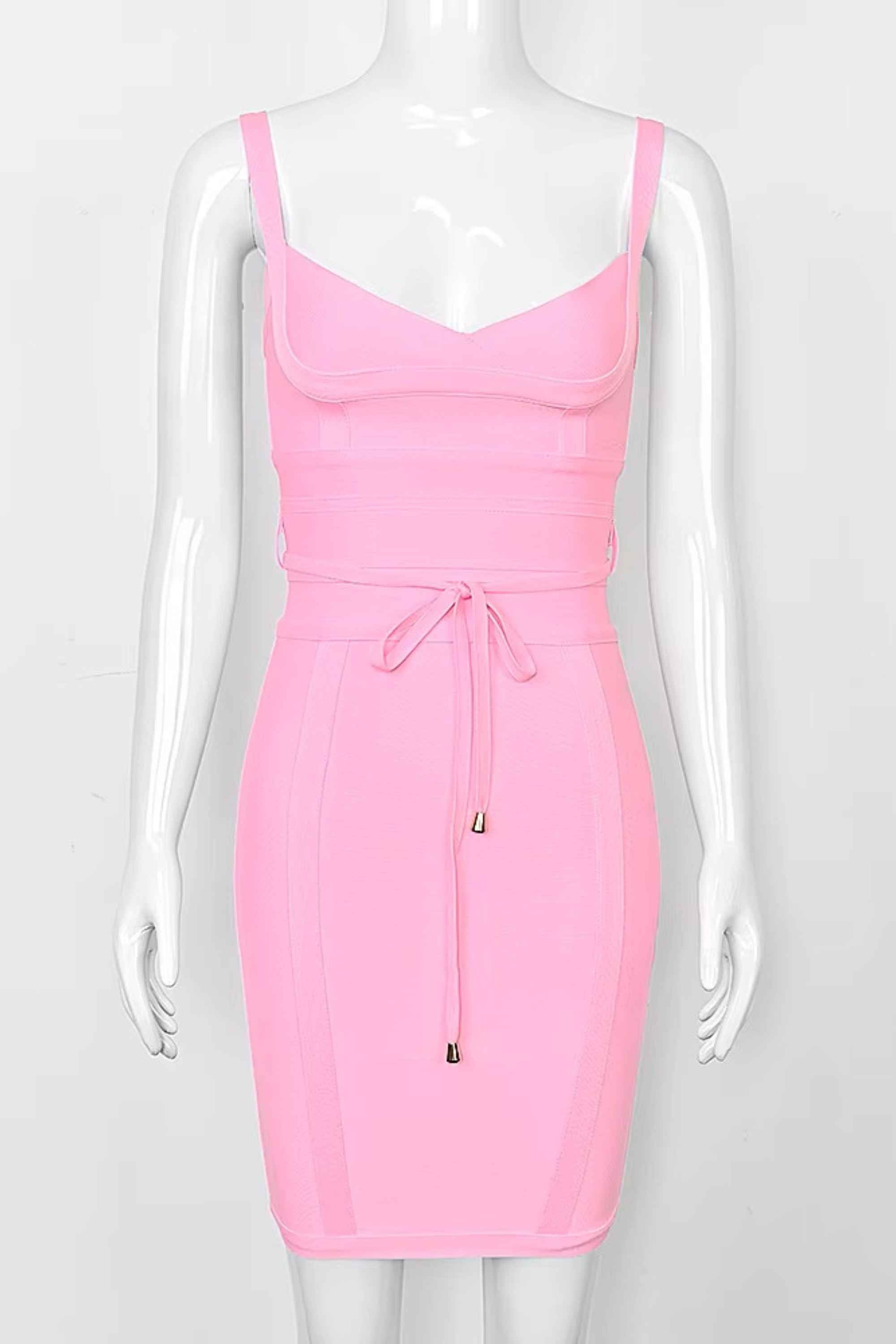 Woman wearing a figure flattering Bek Bandage Dress - Blush Pink Bodycon Collection