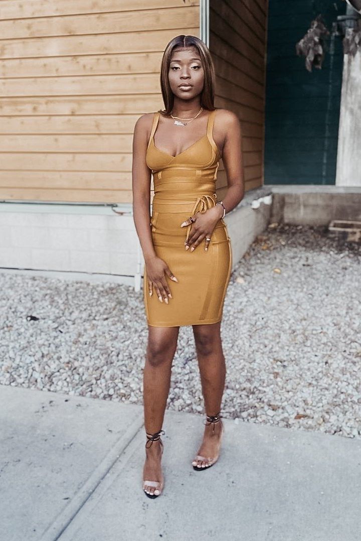 Woman wearing a figure flattering Bek Bandage Dress - Deep Tan Brown Bodycon Collection