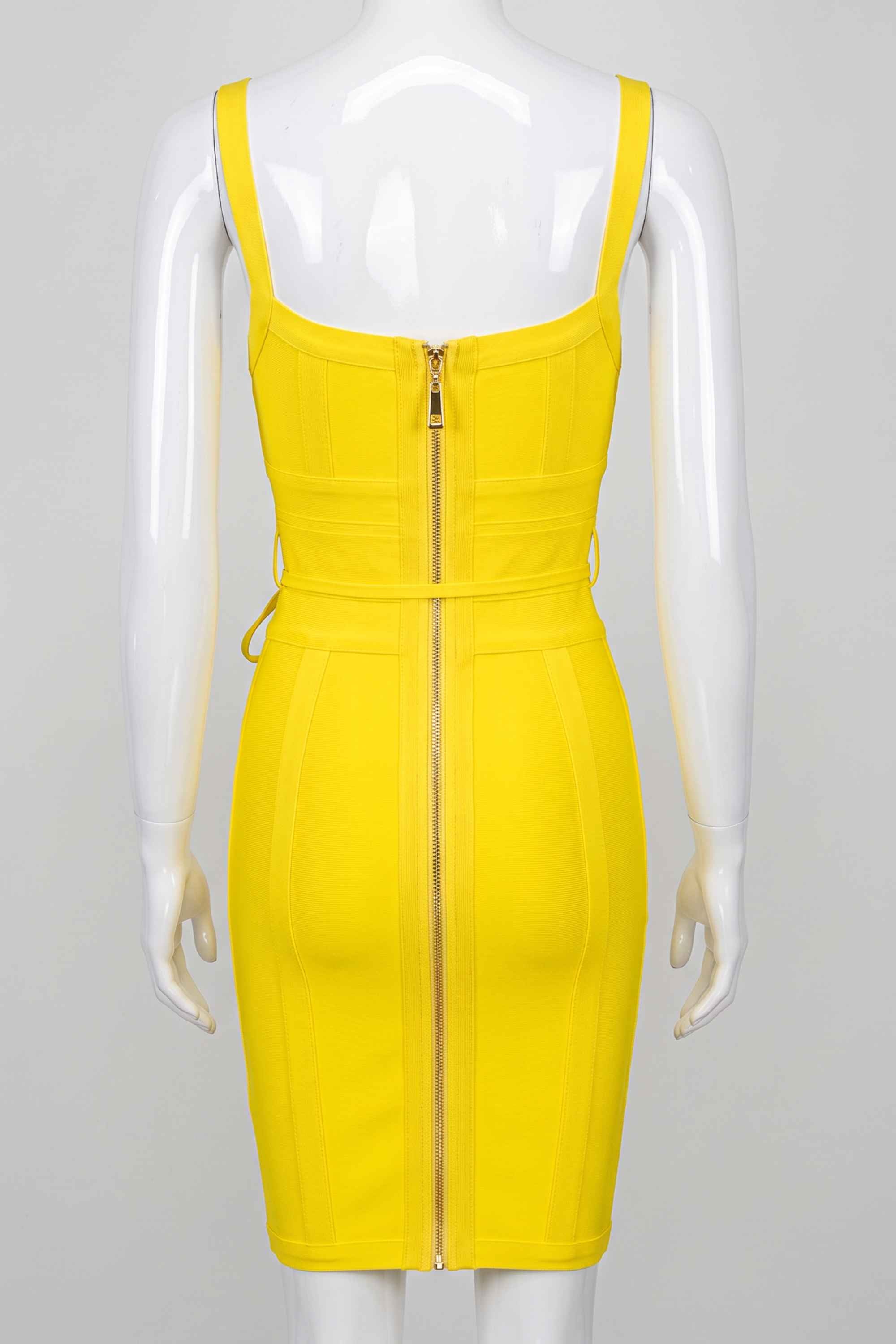 Woman wearing a figure flattering Bek Bandage Dress - Sun Yellow Bodycon Collection