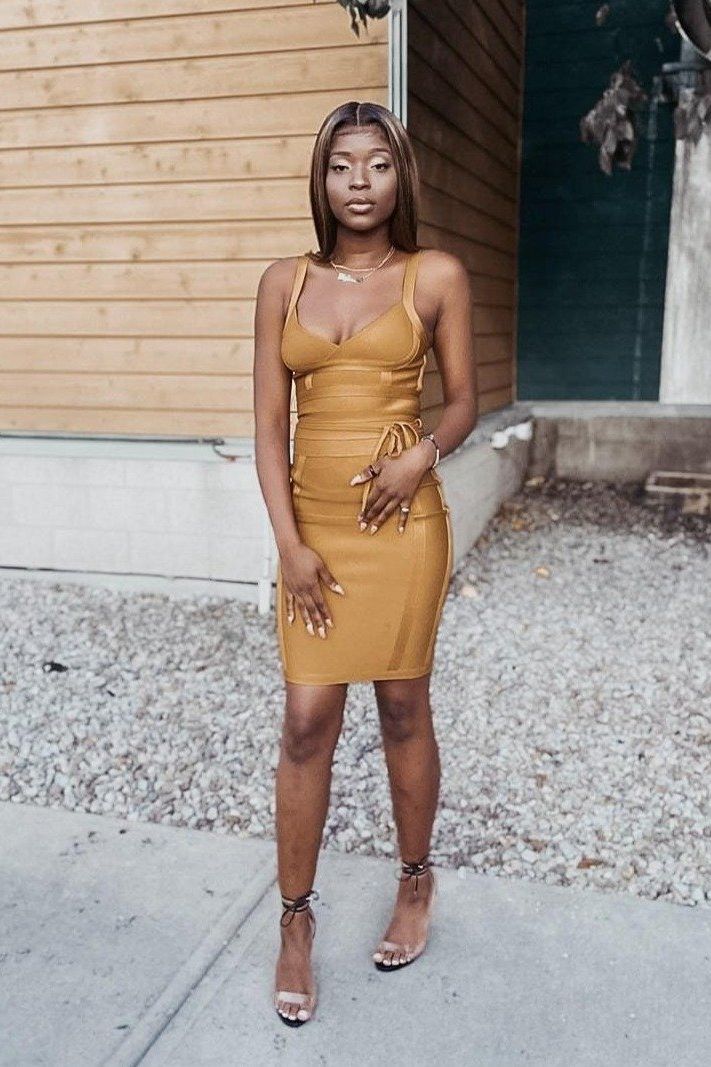 Woman wearing a figure flattering Bek Bandage Dress - Sun Yellow Bodycon Collection