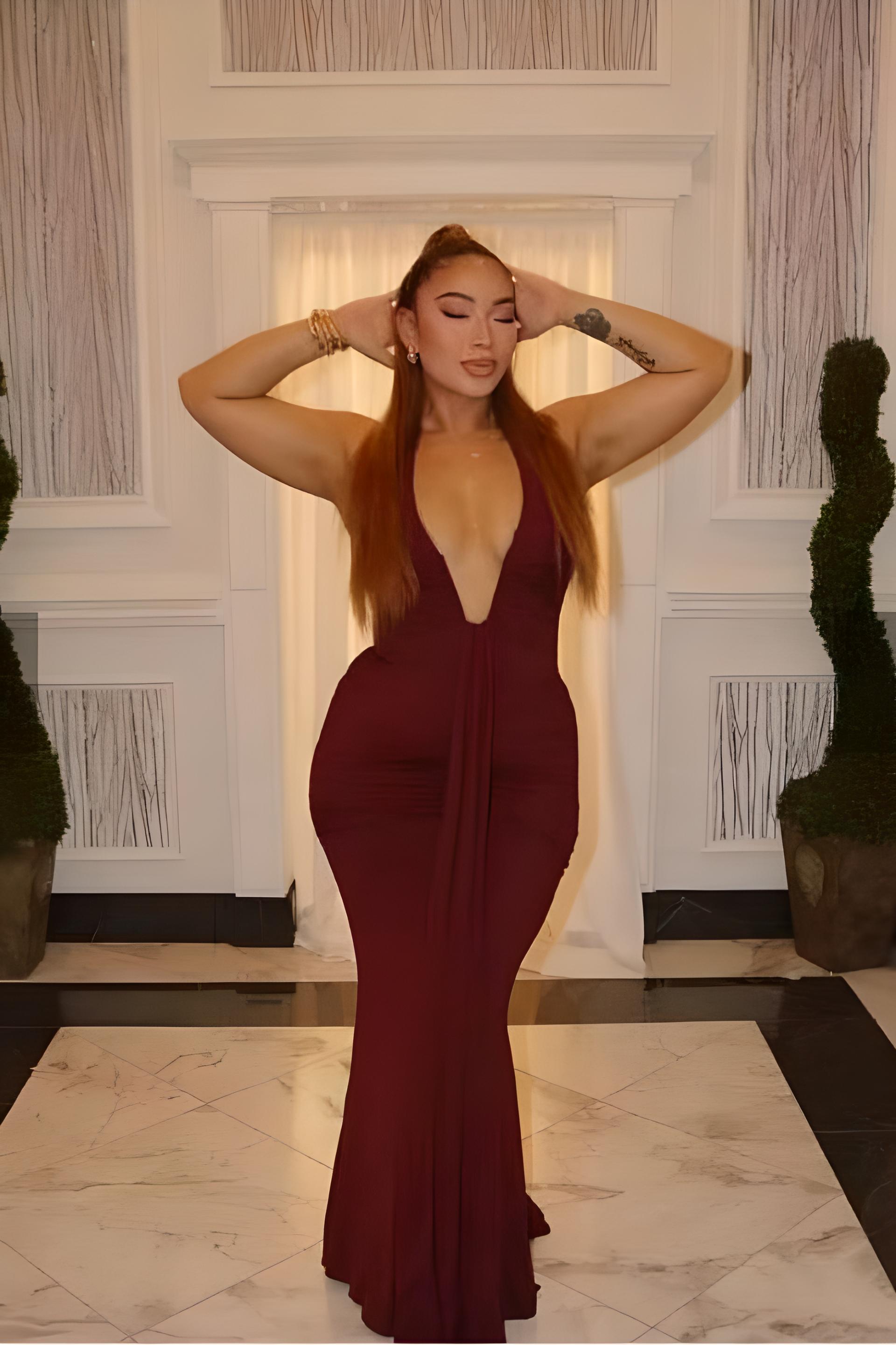 Woman wearing a figure flattering Bella Bodycon Wrap Maxi Dress - Violet BODYCON COLLECTION Pty Ltd