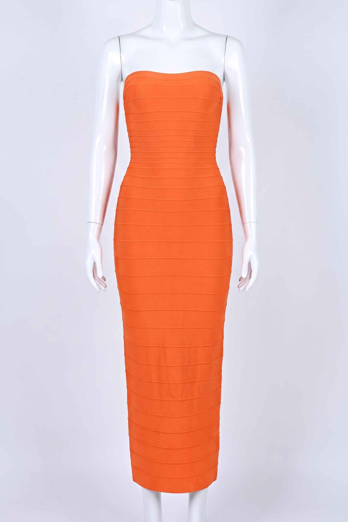 Woman wearing a figure flattering Belle Bandage Maxi Dress - Apricot Orange BODYCON COLLECTION Pty Ltd