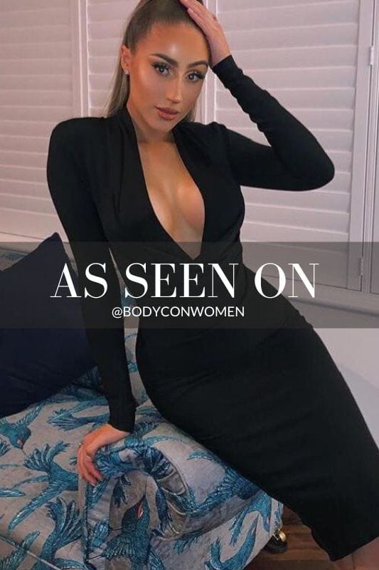 Woman wearing a figure flattering Blaire Long Sleeve Bandage Dress - Classic Black BODYCON COLLECTION