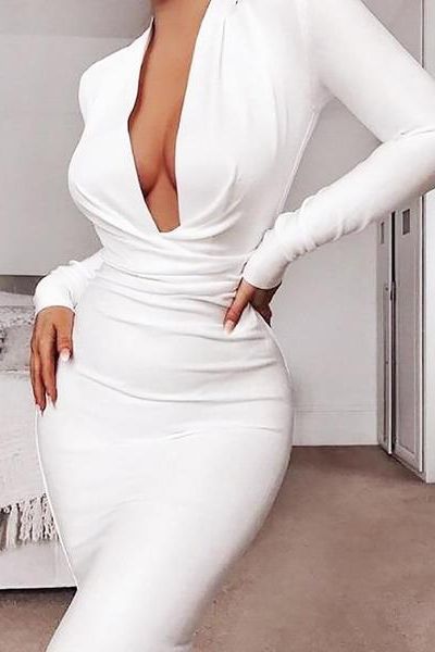 Woman wearing a figure flattering Blaire Long Sleeve Bandage Dress - Tan Brown BODYCON COLLECTION