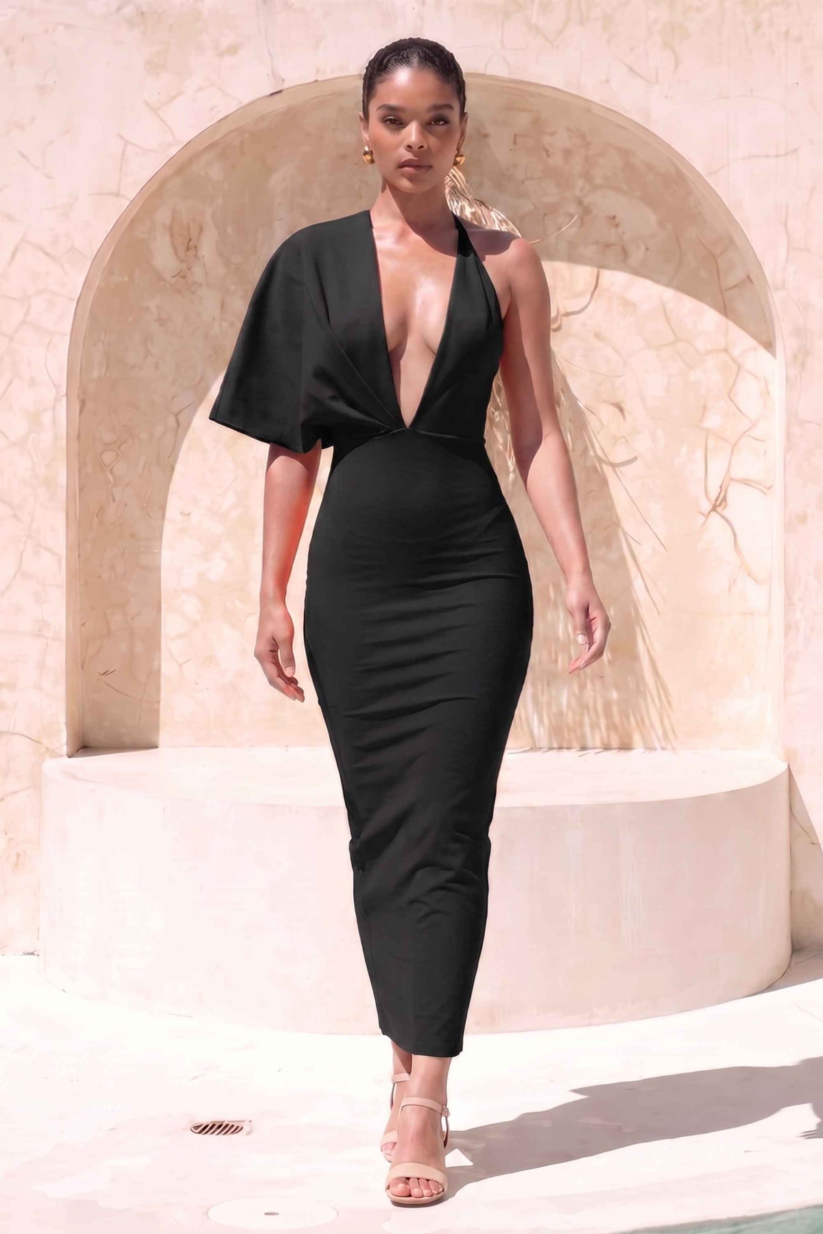 Woman wearing a figure flattering Blake Bandage Maxi Dress - Classic Black BODYCON COLLECTION