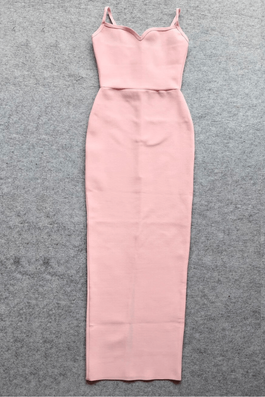Woman wearing a figure flattering Blanche Bandage Maxi Dress - Dusty Pink BODYCON COLLECTION