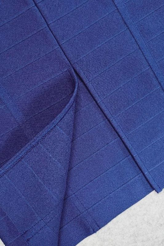 Woman wearing a figure flattering Breanna Bandage Dress - Navy Blue BODYCON COLLECTION