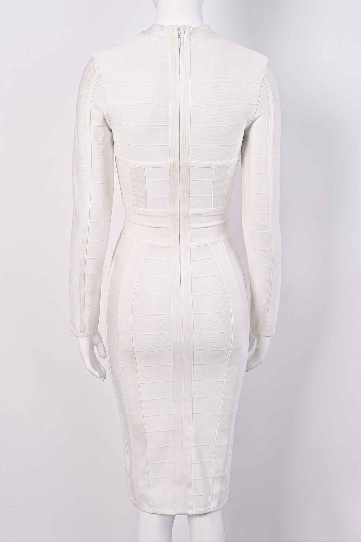 Woman wearing a figure flattering Brooke Long Sleeve Bandage Dress - Pearl White BODYCON COLLECTION