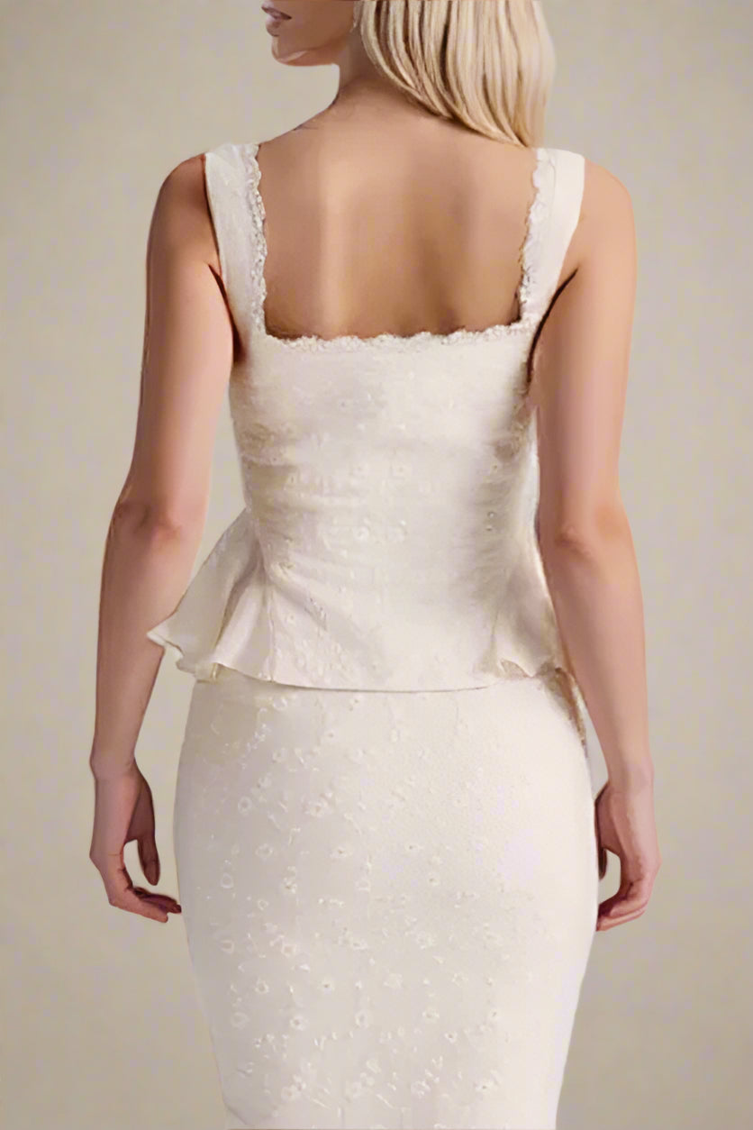 Woman wearing a figure flattering Cali Wrap Top - Ivory White BODYCON COLLECTION