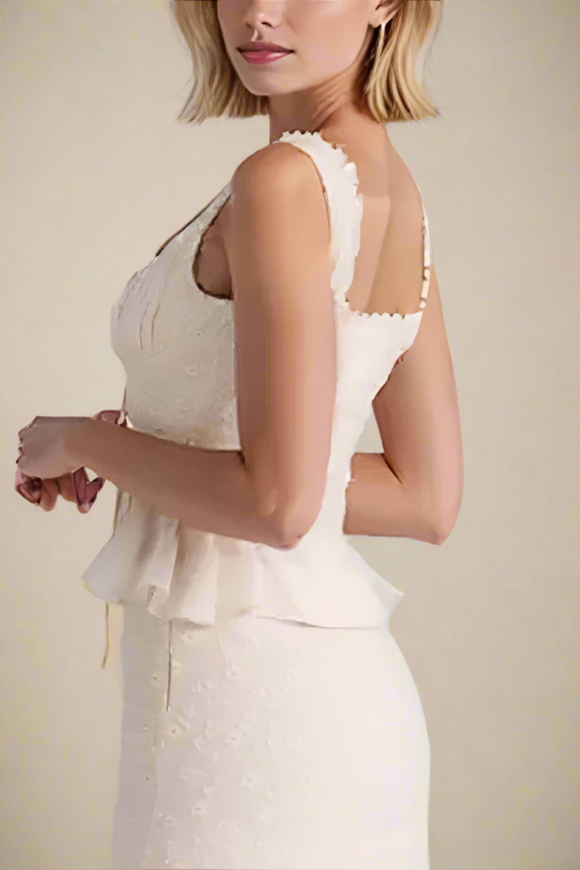 Woman wearing a figure flattering Cali Wrap Top - Ivory White BODYCON COLLECTION