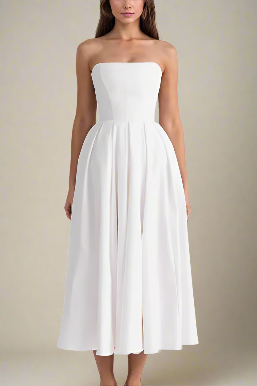Woman wearing a figure flattering Capri Bodycon Strapless Midi Dress - Pearl White BODYCON COLLECTION