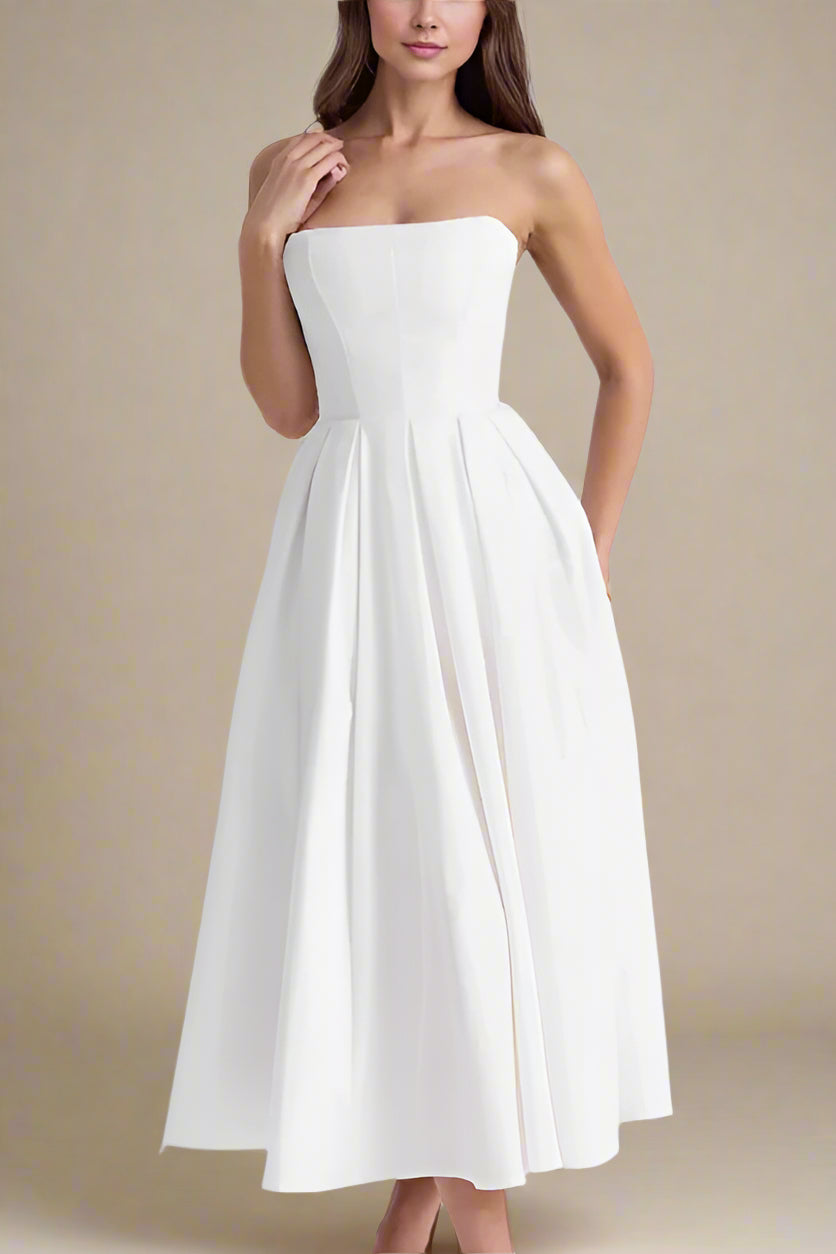 Woman wearing a figure flattering Capri Bodycon Strapless Midi Dress - Pearl White BODYCON COLLECTION