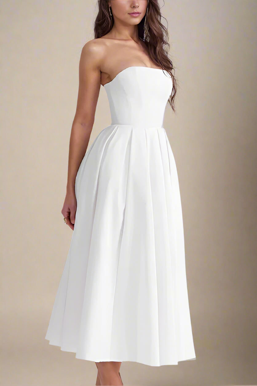 Woman wearing a figure flattering Capri Bodycon Strapless Midi Dress - Pearl White BODYCON COLLECTION