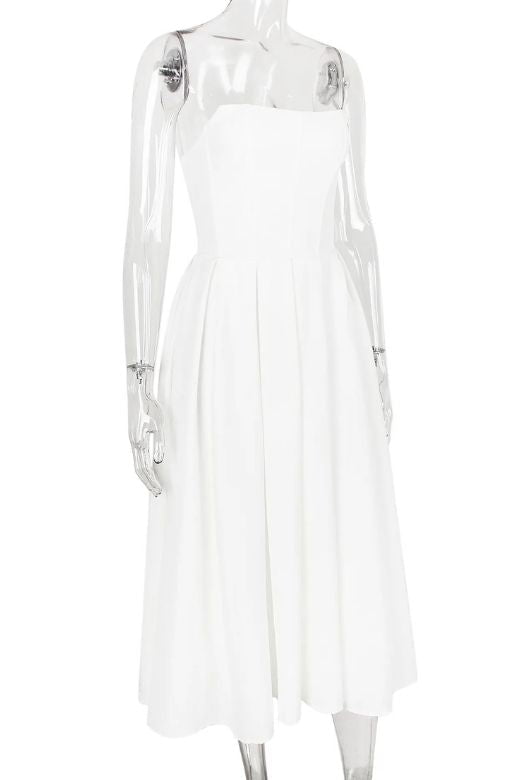 Woman wearing a figure flattering Capri Strapless Midi Dress - White Pearl BODYCON COLLECTION