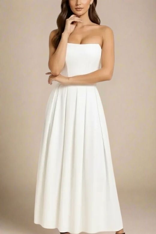Woman wearing a figure flattering Capri Strapless Midi Dress - White Pearl BODYCON COLLECTION