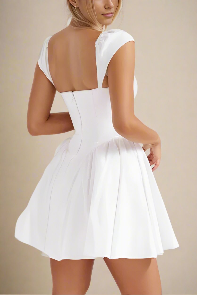 Woman wearing a figure flattering Cara Bodycon Mini Dress - Pearl White BODYCON COLLECTION