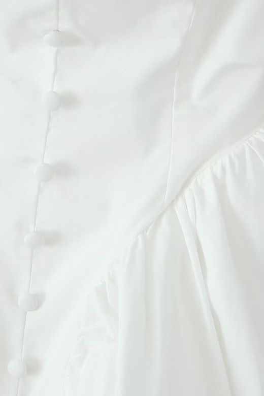 Woman wearing a figure flattering Cara Bodycon Mini Dress - Pearl White BODYCON COLLECTION