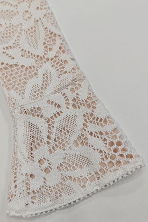 Woman wearing a figure flattering Charlotte Long Sleeve Bodycon Mini Dress - Cream BODYCON COLLECTION