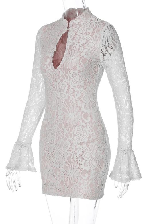 Woman wearing a figure flattering Charlotte Long Sleeve Bodycon Mini Dress - White Pearl BODYCON COLLECTION