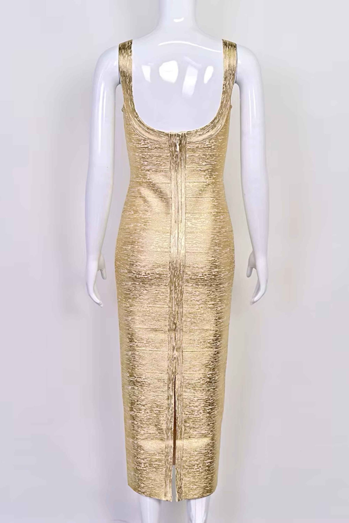 Woman wearing a figure flattering Cindy Bandage Maxi Dress - Gold BODYCON COLLECTION Pty Ltd