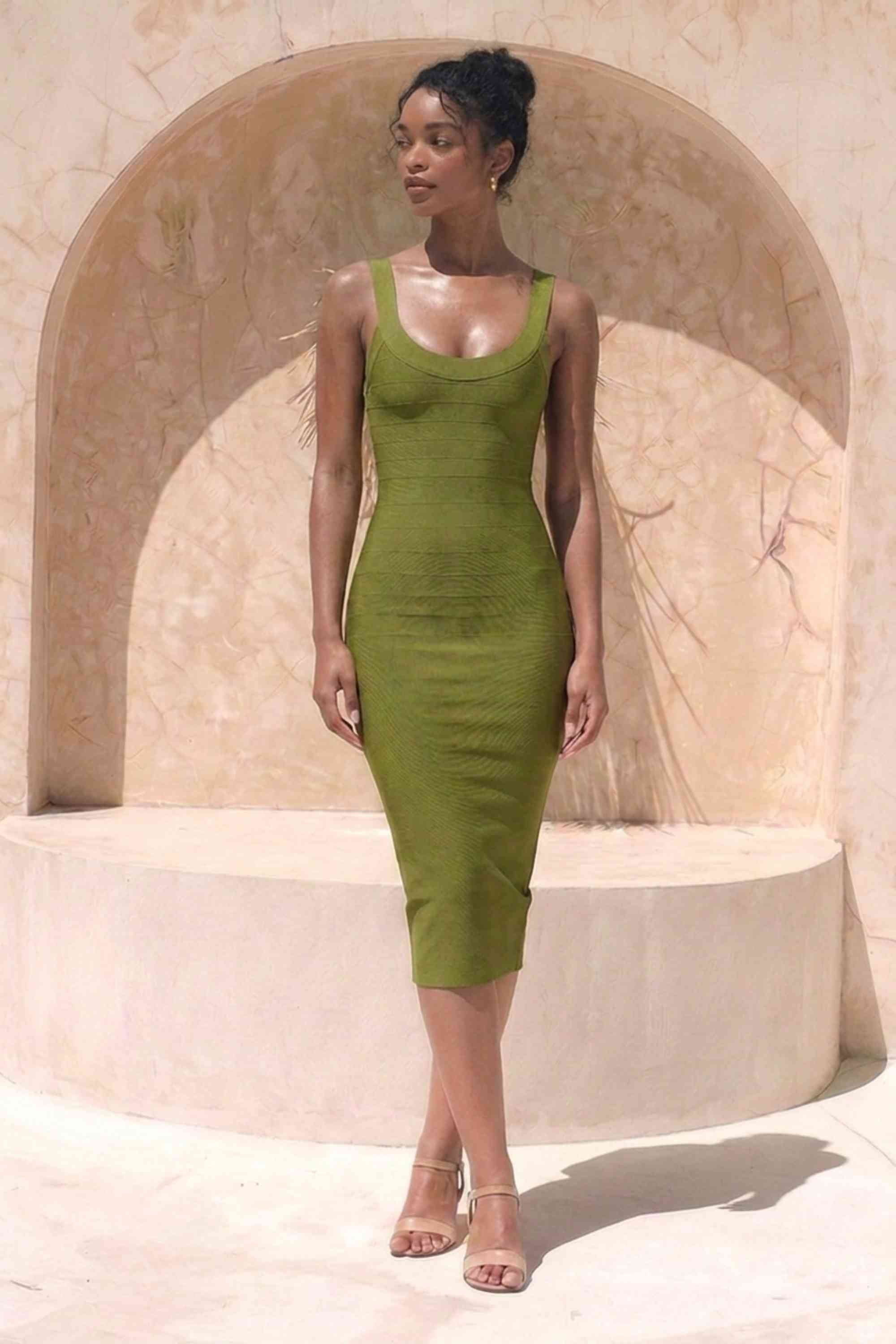 Woman wearing a figure flattering Cindy Bandage Midi Dress - Army Green BODYCON COLLECTION Pty Ltd