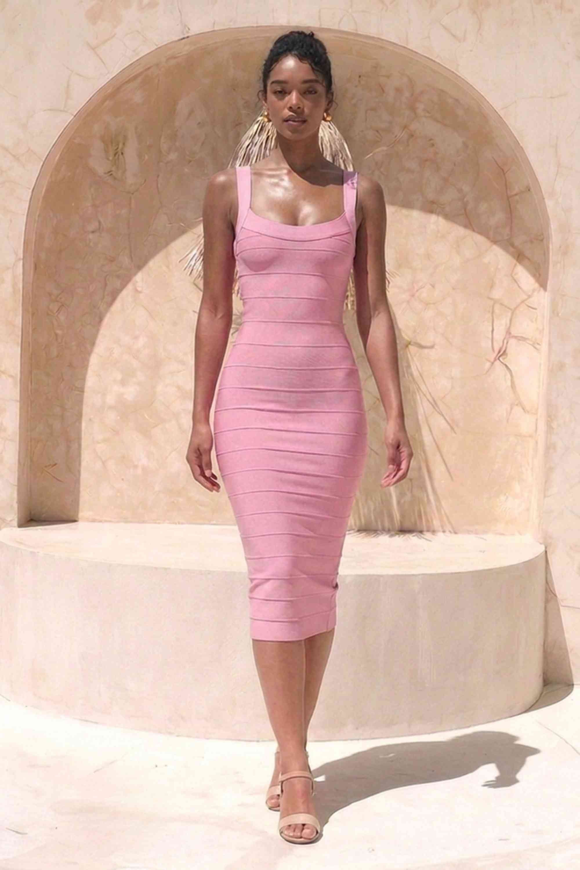 Woman wearing a figure flattering Cindy Bandage Midi Dress - Blush Pink BODYCON COLLECTION Pty Ltd