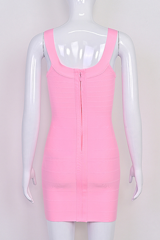 Woman wearing a figure flattering Cindy Bandage Mini Dress - Blush Pink BODYCON COLLECTION Pty Ltd
