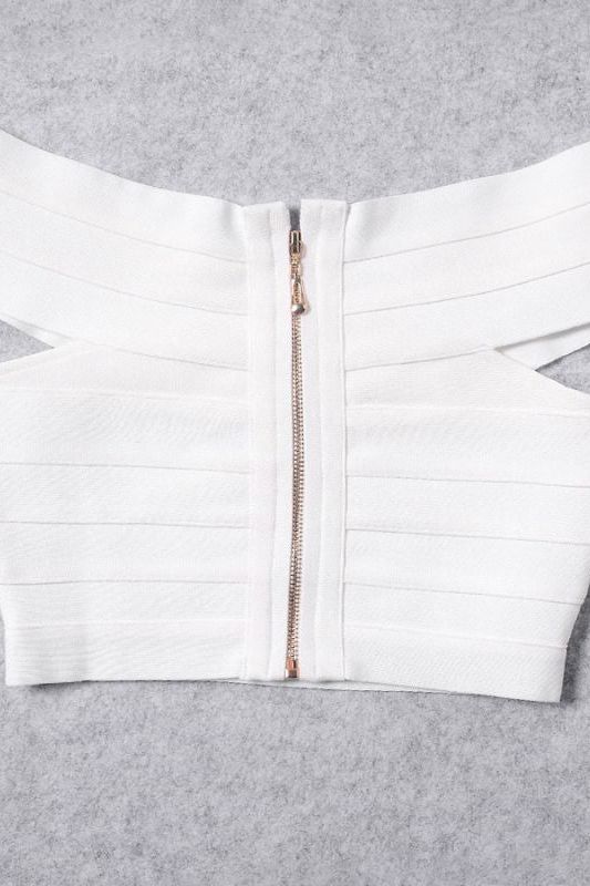 Woman wearing a figure flattering Cindy Bandage Off Shoulder Crop Top - Pearl White BODYCON COLLECTION