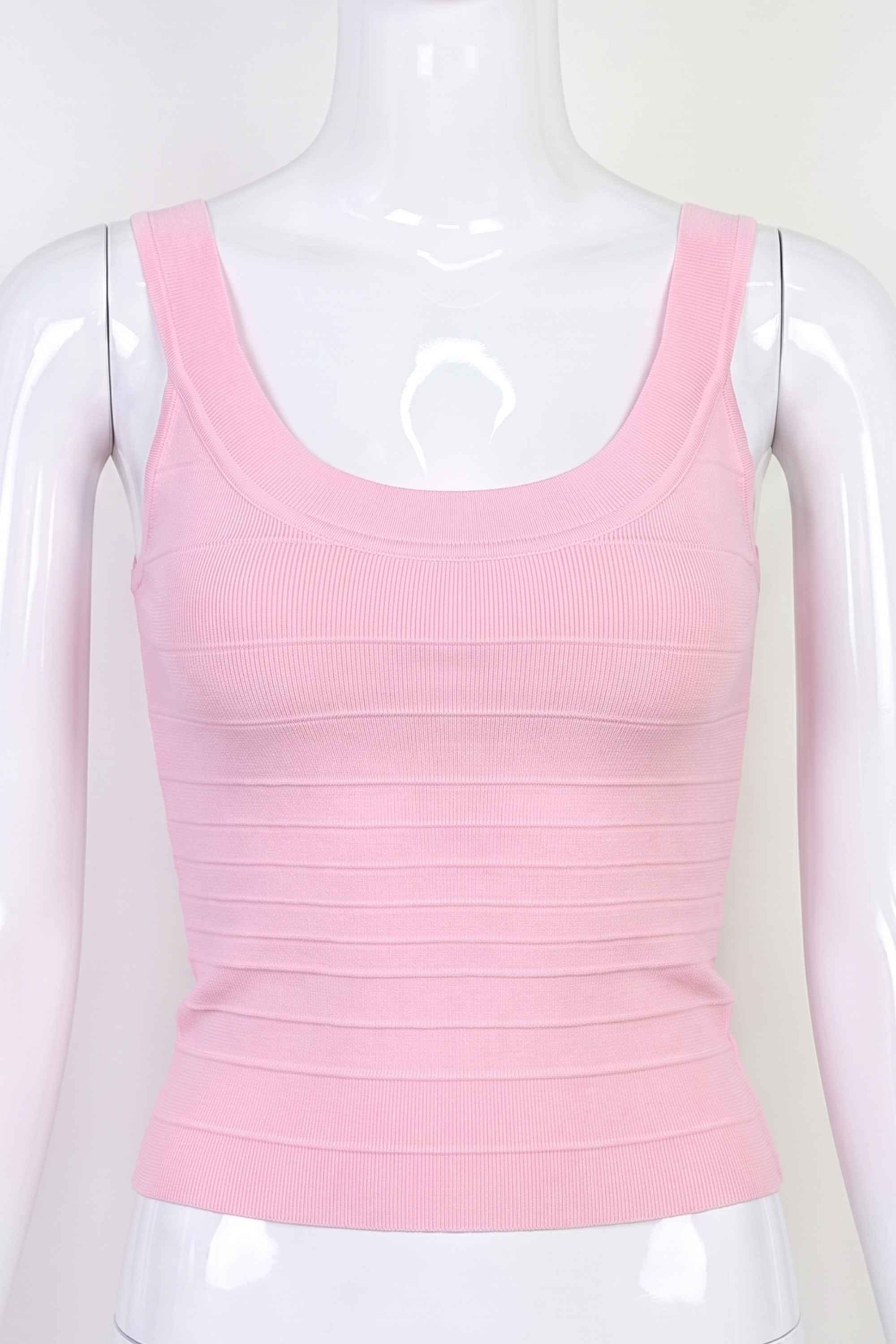 Woman wearing a figure flattering Cindy Bandage Top - Dusty Pink BODYCON COLLECTION Pty Ltd