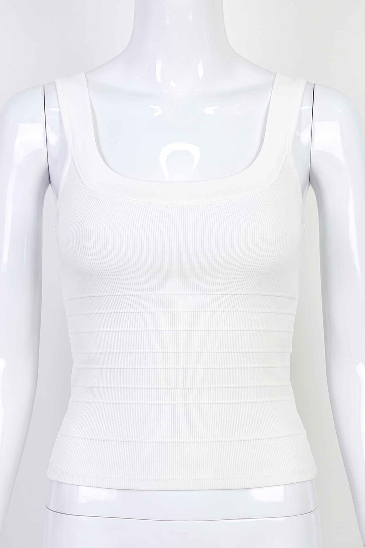 Woman wearing a figure flattering Cindy Bandage Top - Pearl White BODYCON COLLECTION Pty Ltd